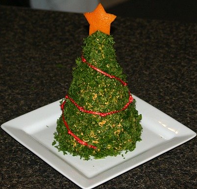 christmas tree made of cheese serve with party crackers