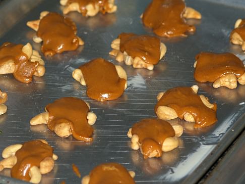 Cream Mixture Spooned over Cashew Nuts